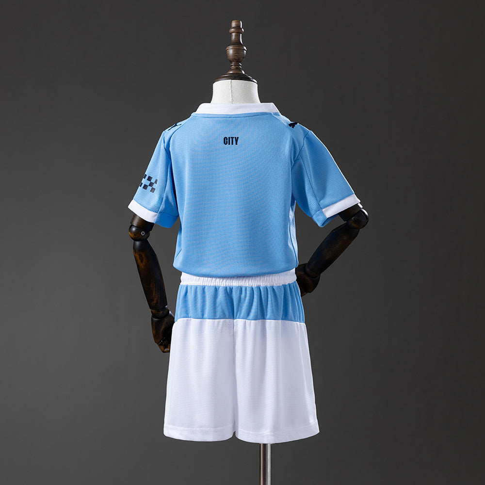 Manchester City Casa 25/26 - Bambino (pantaloncini inclusi)